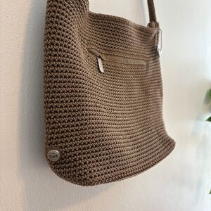 The SAK tan slouchy crocheted weave shoulder crossbody hobo bag